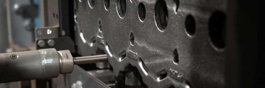 <h1><strong>Eliminating Burned-On Sand</strong> in Cylinder Heads</h1>