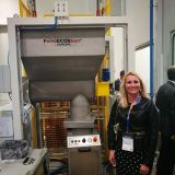 Our Managing Director, Mojca Andolšek in front of our machine
